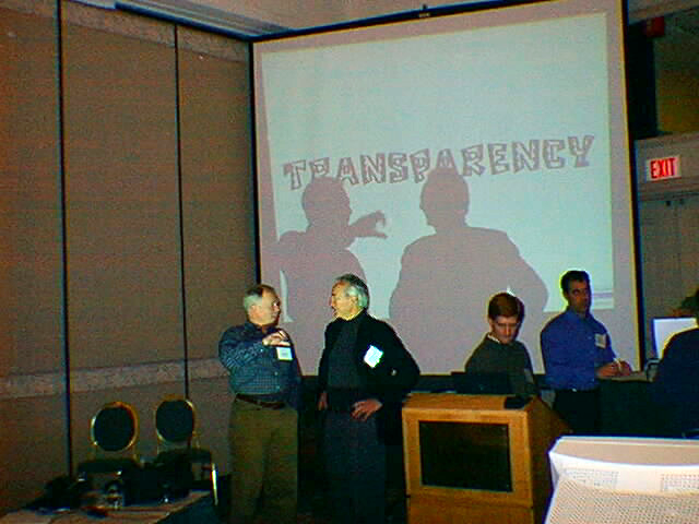 1998 - Charlie Nesson of the Berkman Center for the Internet and Society at Harvard Law School (center, black shirt) led the cautious discussion on 'transparency.' Source: http://www.tftb.com/